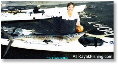 kayak fishing sail fish photo